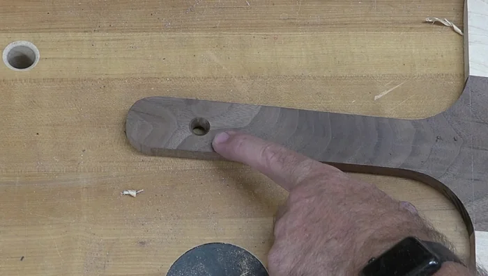 Drill a hole for hanging.