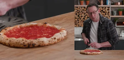 Use the front of the oven as a pivot point, pulling and pushing the peel to rotate the pizza.