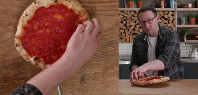 Use the front of the oven as a pivot point, pulling and pushing the peel to rotate the pizza.