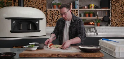 Heat the peel to ensure it's dry and slides easily.