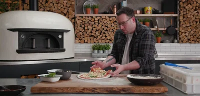 Heat the peel to ensure it's dry and slides easily.