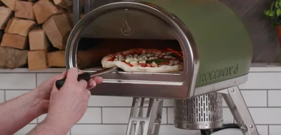 Heat the peel to ensure it's dry and slides easily.