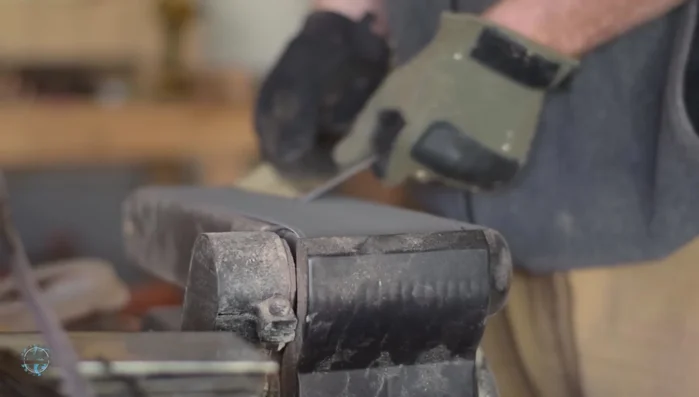 Refine the edges and remove tool marks using a random orbital sander.