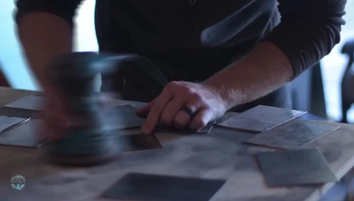 Refine the edges and remove tool marks using a random orbital sander.