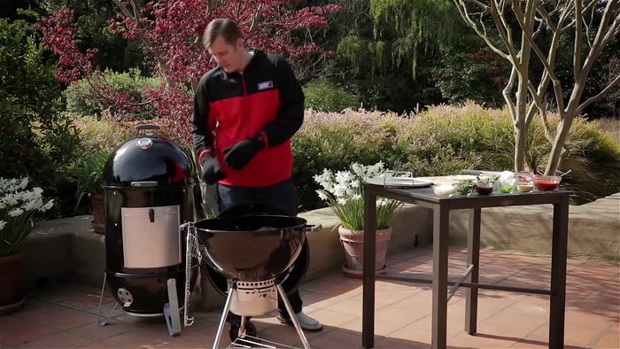 Place the cooking grate on your grill.