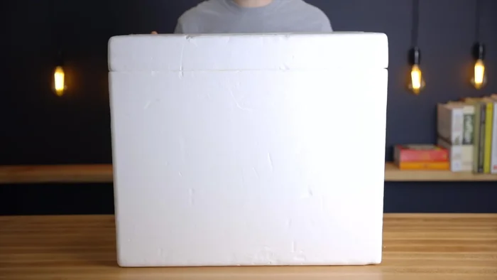 Acquire necessary components: a large styrofoam cooler, a seedling heating mat, a temperature controller, and a half sheet cooling rack.