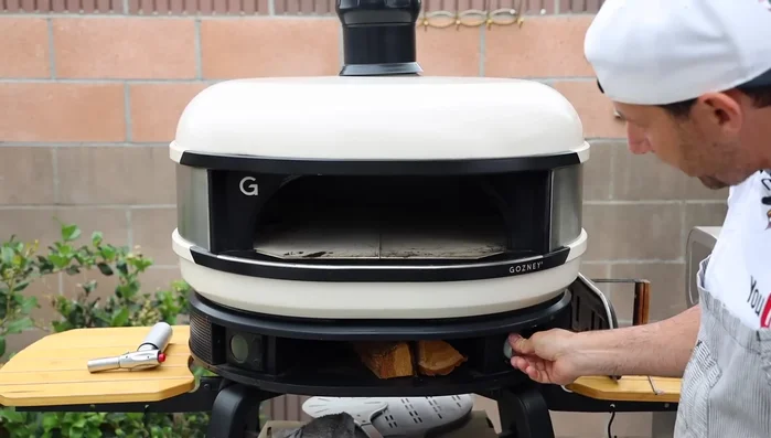 Preheat for 40-60 minutes (or up to 1 hour) to reach the optimal temperature for pizza cooking. The bottom of the oven (the stone) should reach around 700°F (371°C).
