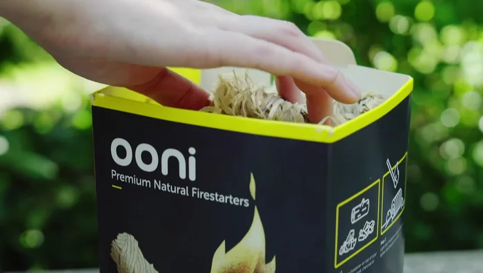 After five minutes or when the starter pellets are alight, gradually add more pellets to the hopper until full.