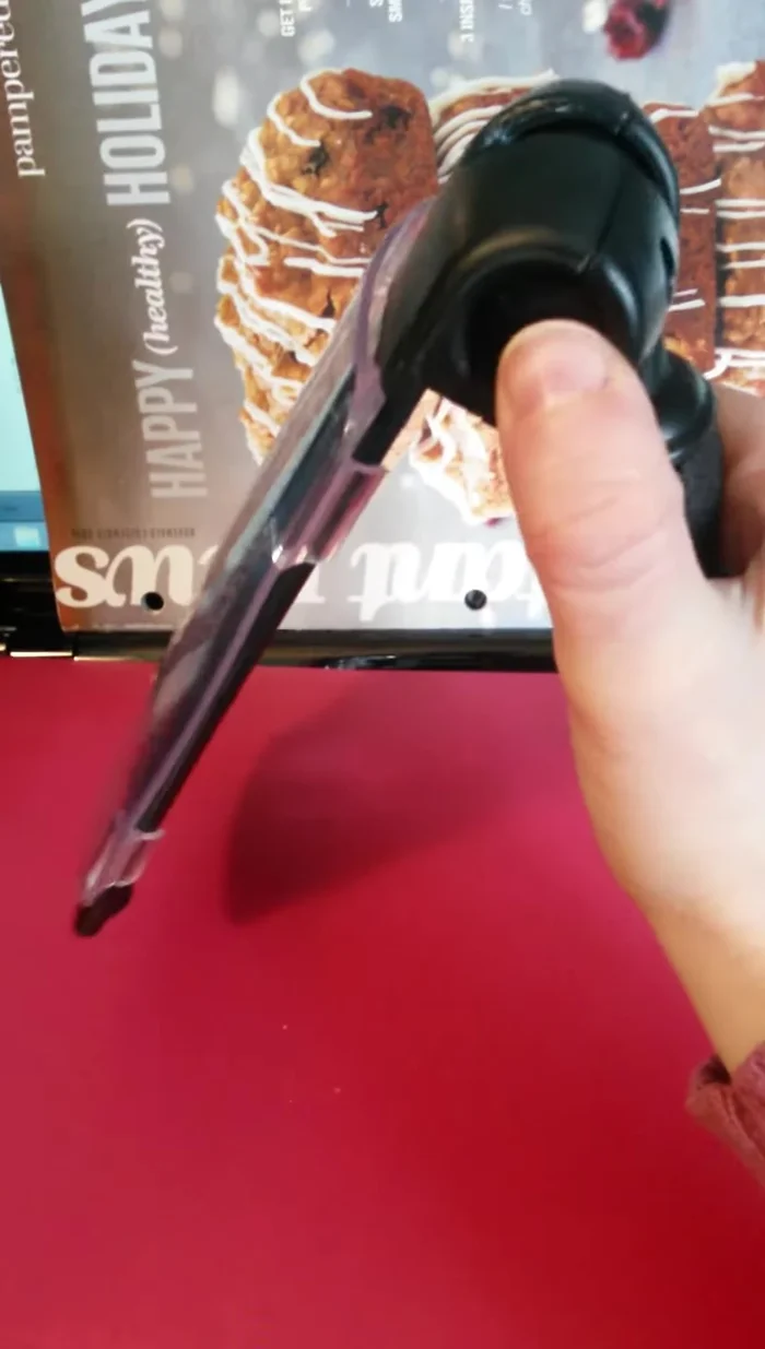 Slide the grater closed for storage.