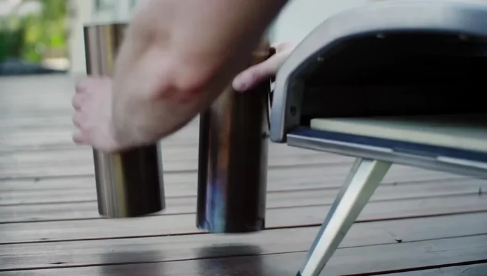 Place the oven door on the front.