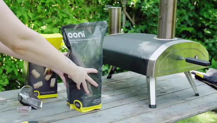 Continue to top up pellets little and often until the hopper is full. A full hopper will burn for 15 minutes.