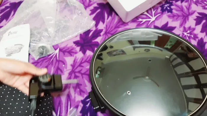 Connect the power cord. Remember to turn on the power switch *after* the pan is set up to prevent electrical hazards.