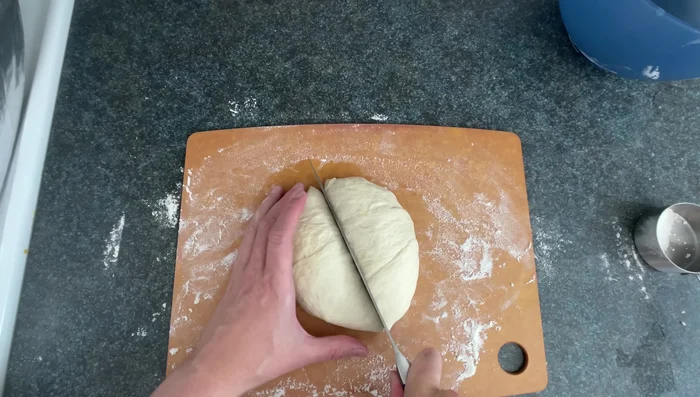 Assemble the Pizza: Add a layer of pizza sauce, then sprinkle toppings and shredded mozzarella cheese evenly.