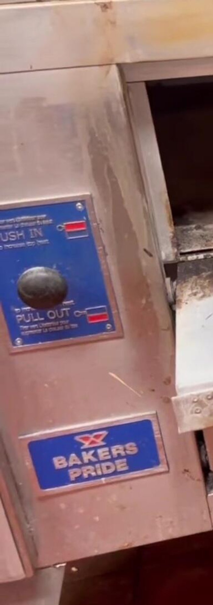 Give the oven a quick scrub to remove any remaining loose particles.