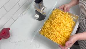 Quick & Easy Cheese Grating: The Must-Have Kitchen Gadget