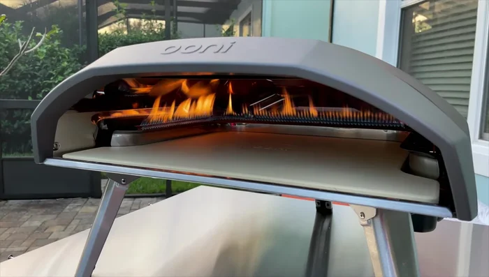 Prepare your pizza: While the oven preheats, prepare your pizza.