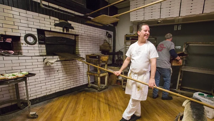 Prepare your pizza dough and toppings.