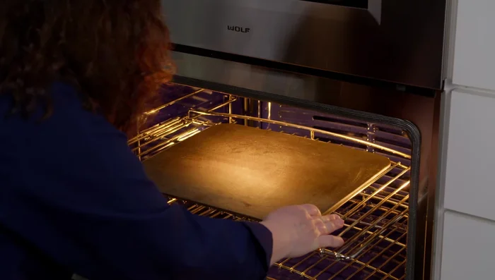 Prepare your pizza dough and toppings.