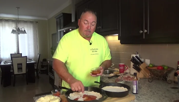 Add toppings to the pre-baked crusts.