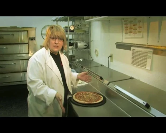 Preheat the oven and pizza stone: Preheat your oven to its maximum temperature (ideally around 500°F/260°C, but adjust as needed for your oven). Place the seasoned pizza stone inside to preheat.