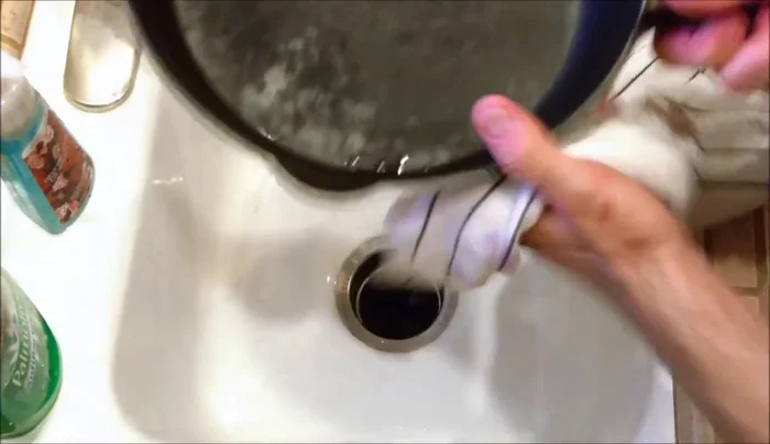 Heat the pan on the stovetop to evaporate any remaining moisture. This prevents rust.