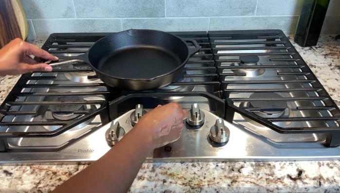 Cast iron skillet on a gas stovetop