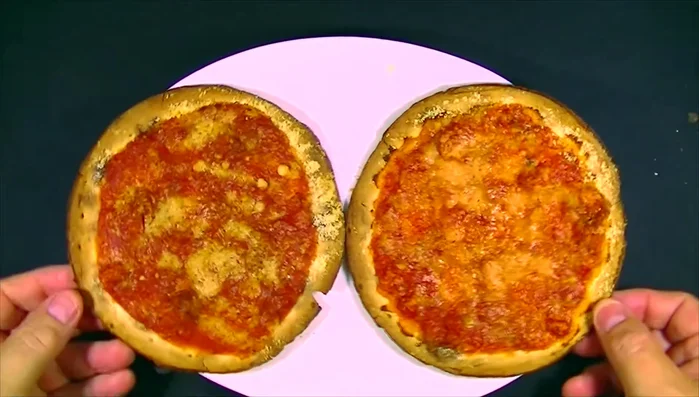 Two mini pizzas, taste test comparison.