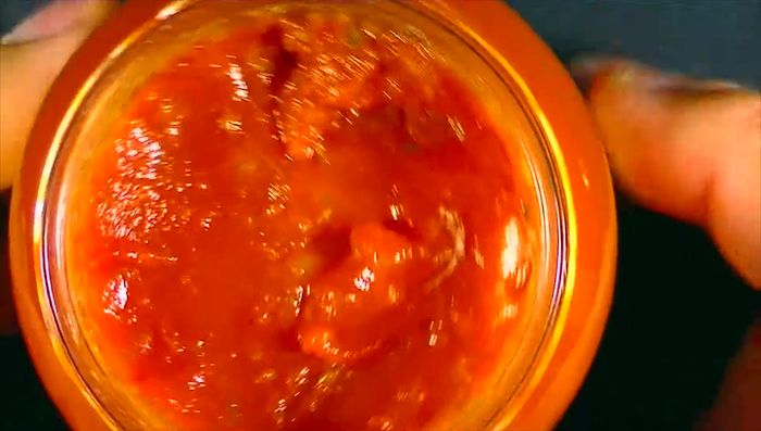 Close-up of spaghetti sauce in a jar.