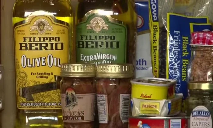 Mediterranean pantry staples: olive oil, beans, anchovies