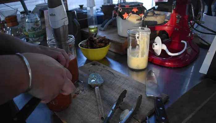 Homemade pizza sauce and mayonnaise preparation.