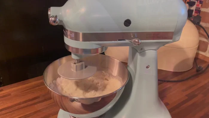 Stand mixer with dough hook and bowls