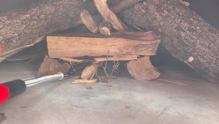 Maintain the pizza in one spot to avoid uneven cooking. If necessary, add additional wood to sustain the flame and convection heat.