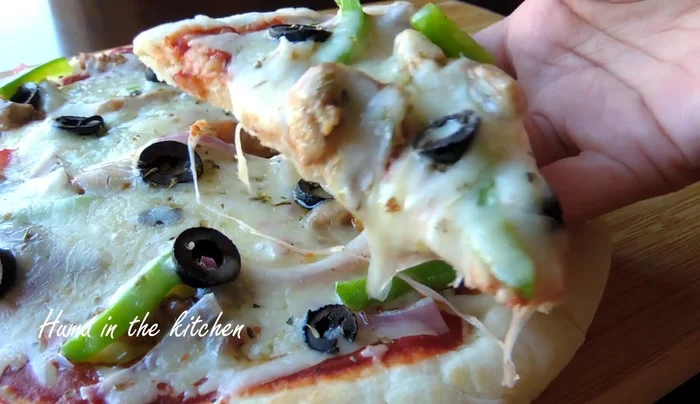 Let the dough rise: Place the dough in a greased bowl, cover, and let it rise for 1.5 hours.