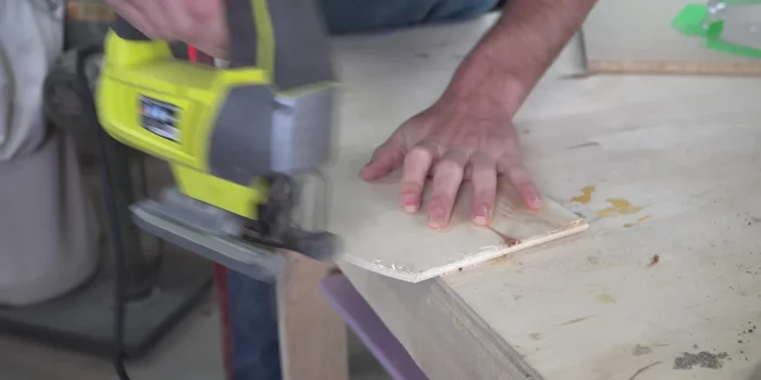 Create the archway mold using cardboard templates and wood.