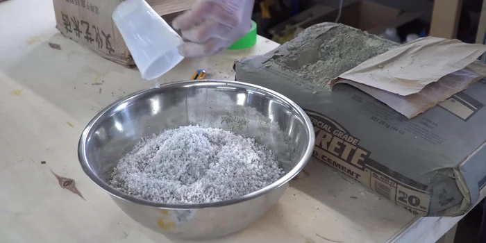 Cut and mortar thin concrete bricks onto the oven.