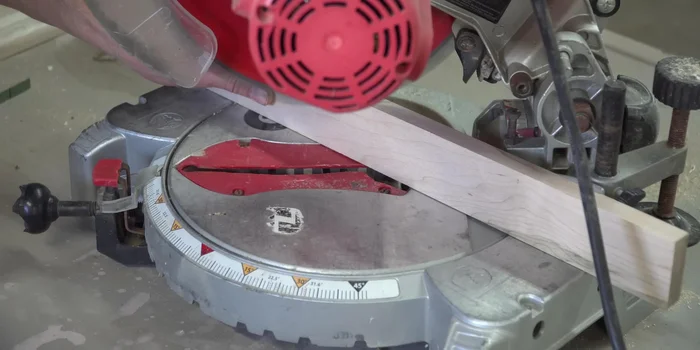 Attach the wooden base to the oven.