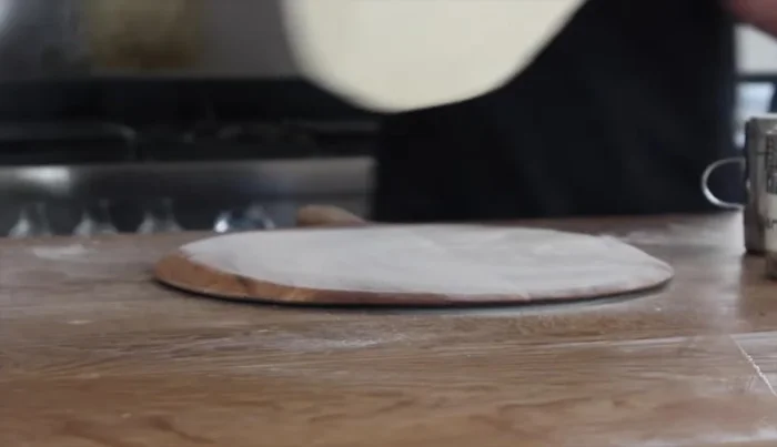 The 'Jimmy' motion: Use a gentle back-and-forth motion (the 'Jimmy') to keep the dough loose and prevent sticking.