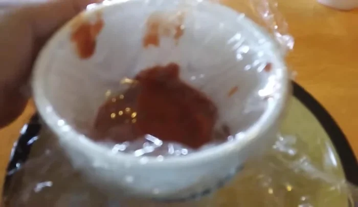 Secure the double-layered cups with another rubber band.