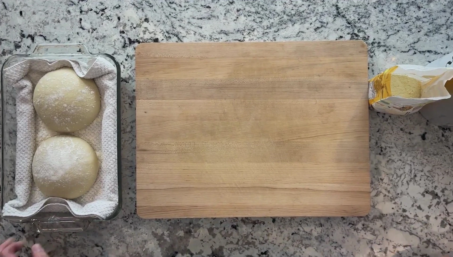 Preparing the pizza dough.