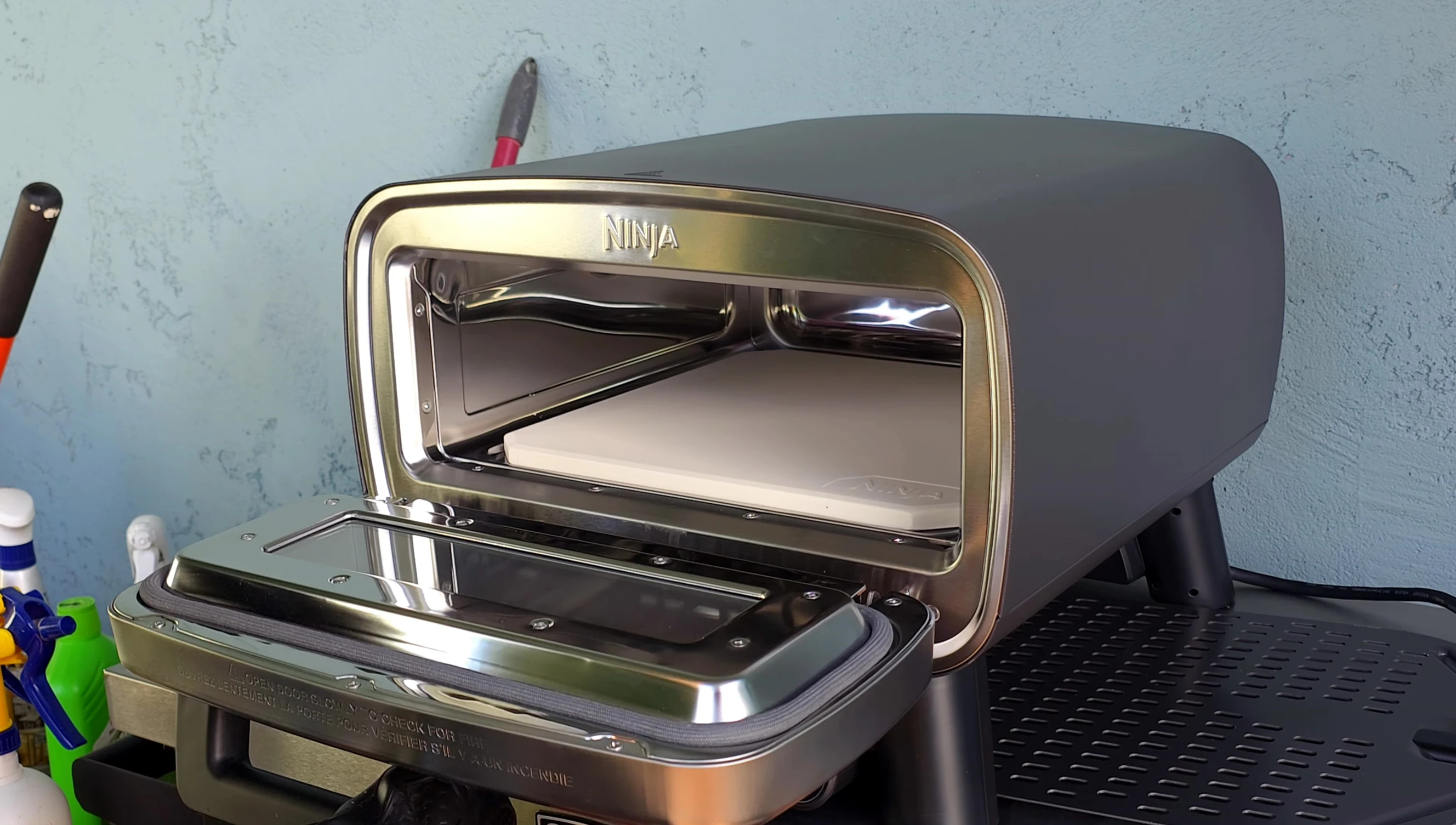 Chicken placed inside the Ninja Artisan pizza oven.
