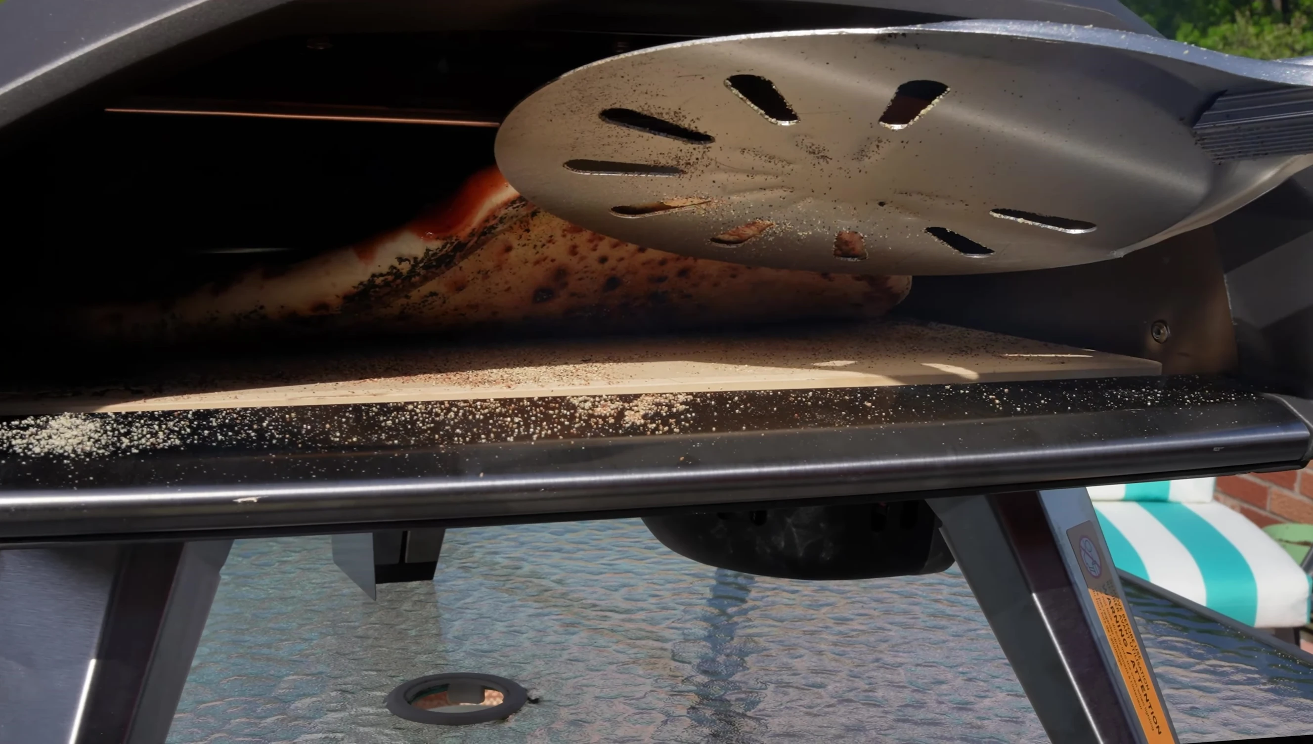 Close-up of the cooked pizza showing perfect leopard spotting.