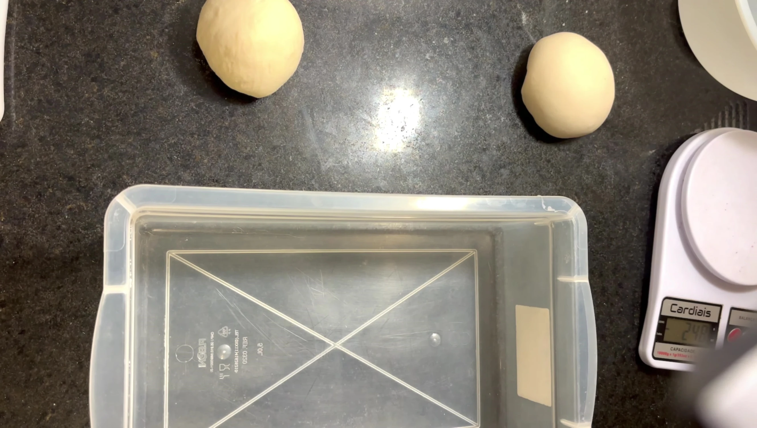 Dough placed in a container for refrigeration