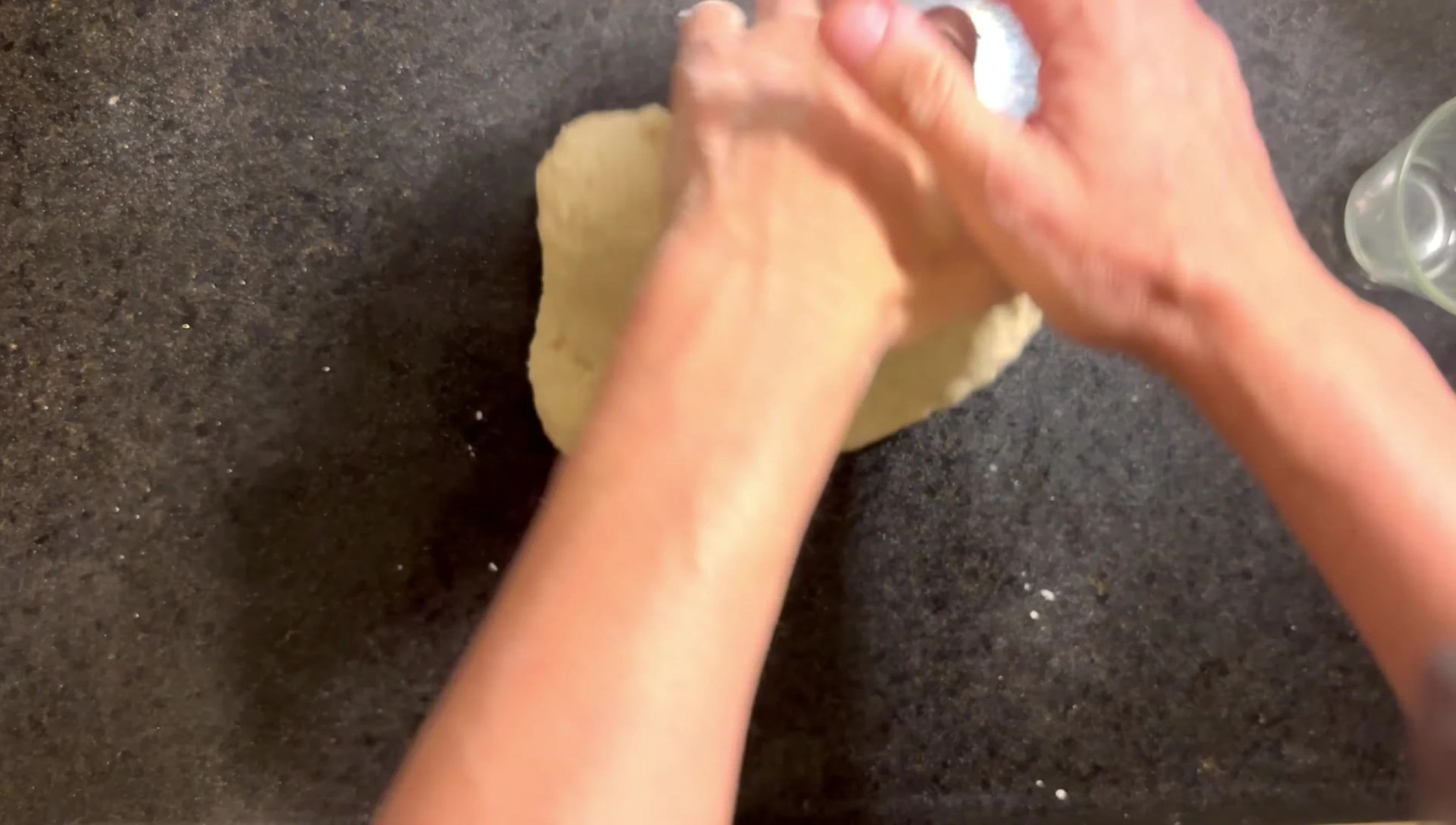 Flour being scooped from the bag