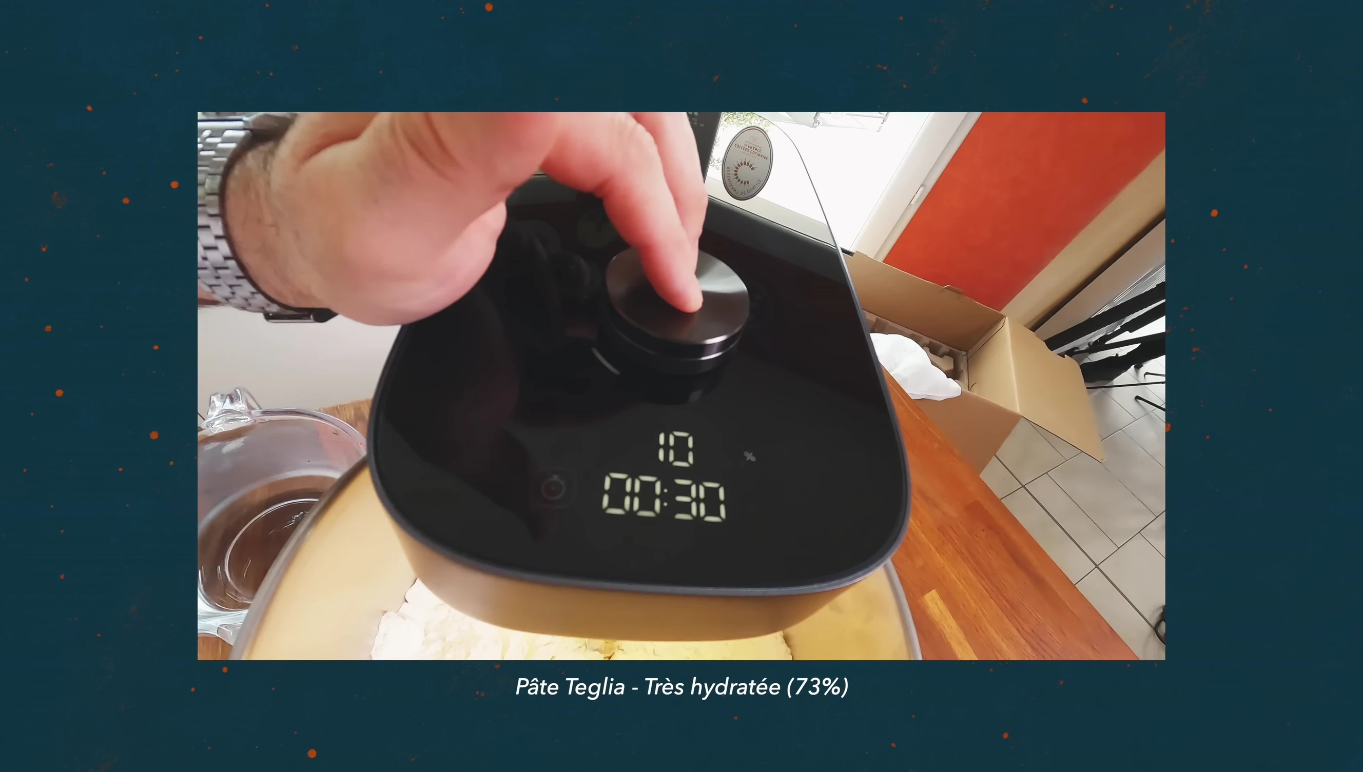 Demonstrating the pause/start button.