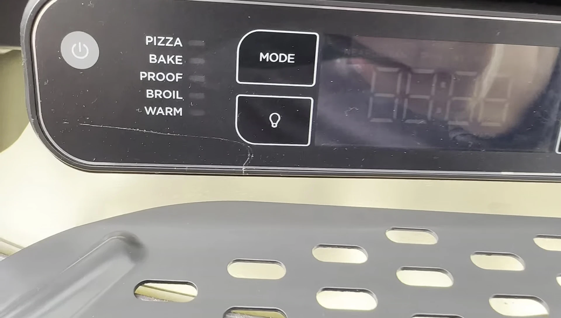 The oven showcasing its various cooking functions