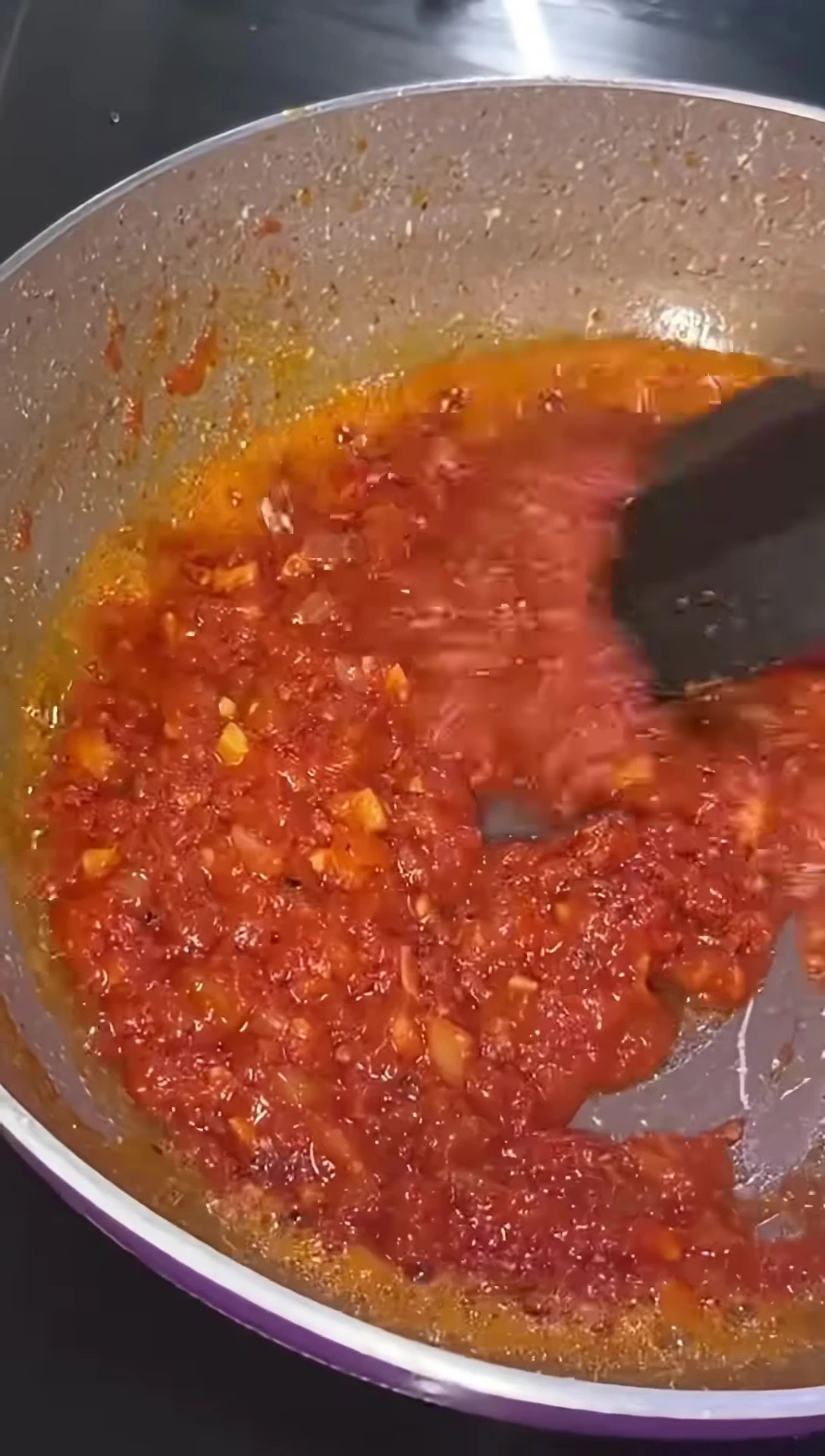 Adding vinegar to the sauce