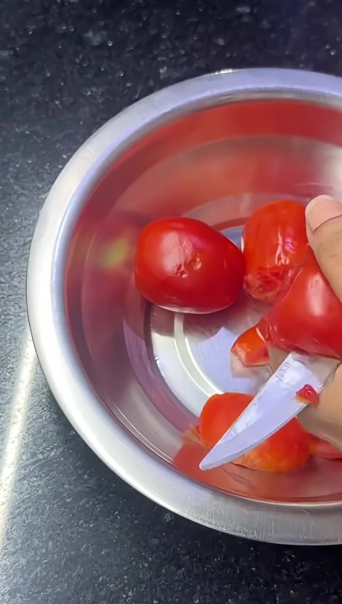 Chopping tomatoes roughly