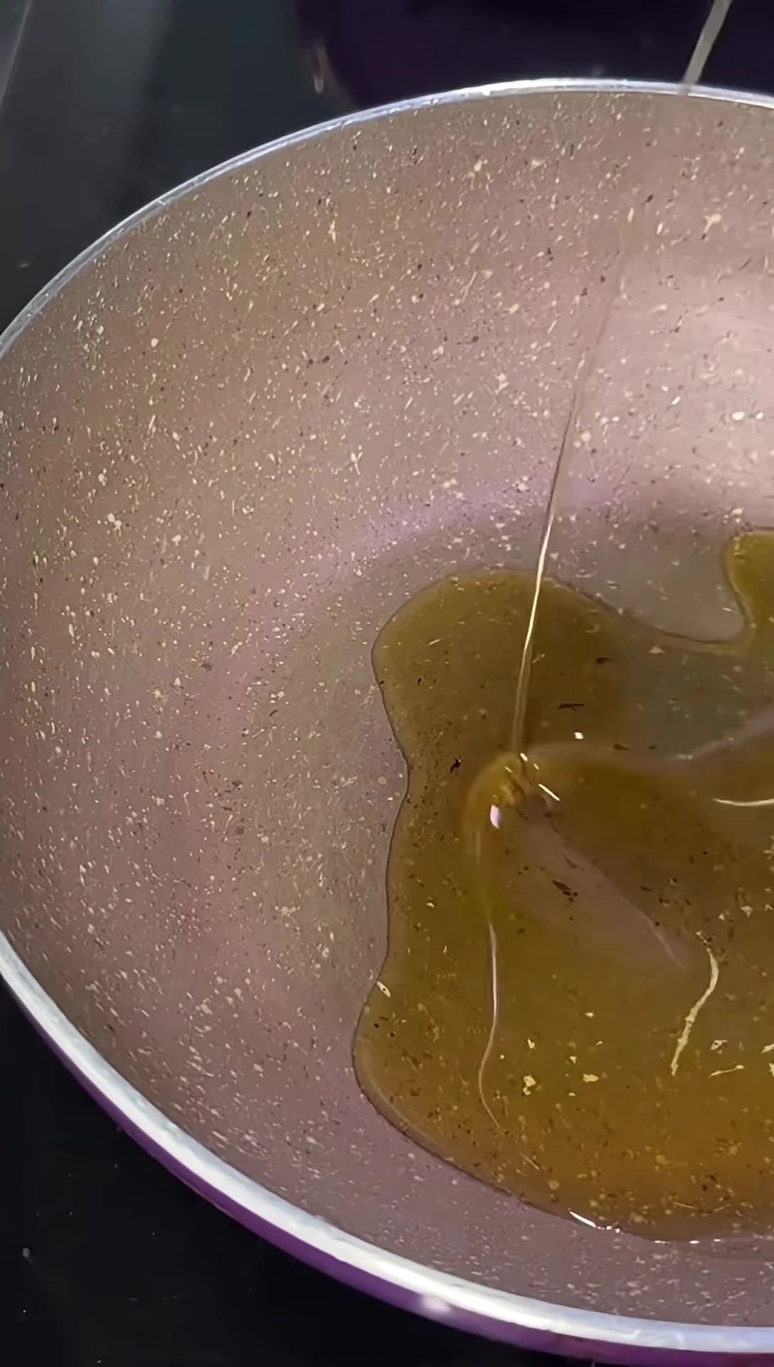 Adding oil to the pan