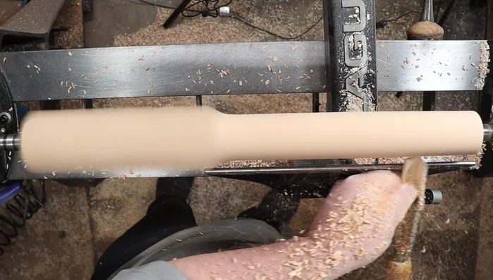 Check roundness with your hand and refine the dowel until perfectly round, using calipers to ensure consistency.