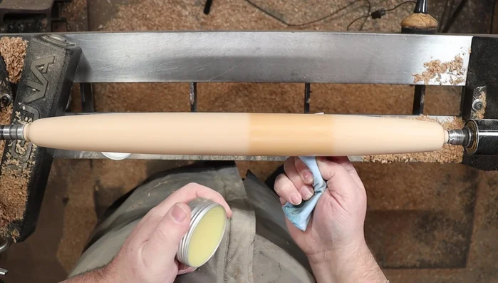 Apply multiple coats of wood oil and waxes, allowing each to soak in and dry.